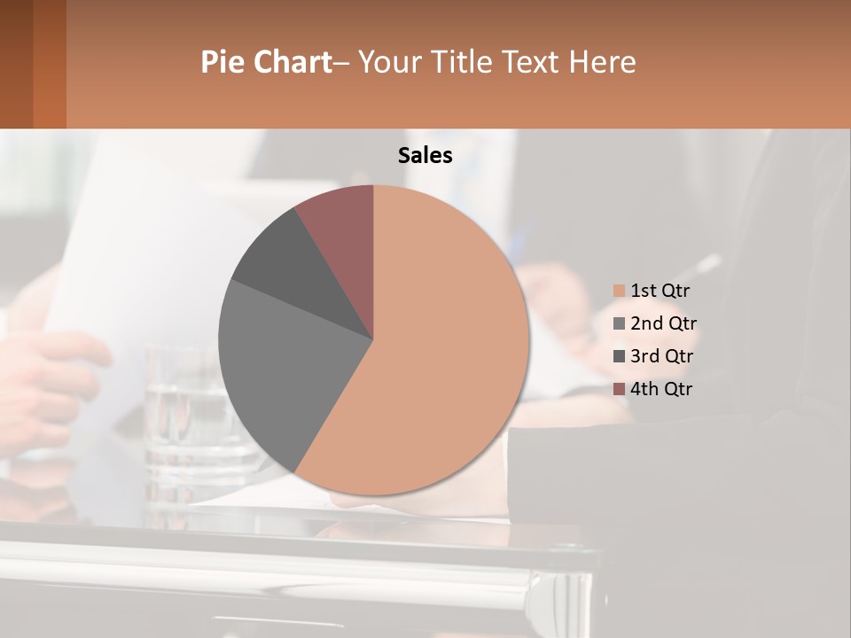 A Group Of People Sitting At A Table Writing On Paper PowerPoint Template