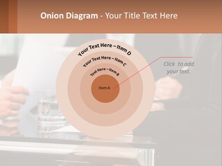 A Group Of People Sitting At A Table Writing On Paper PowerPoint Template