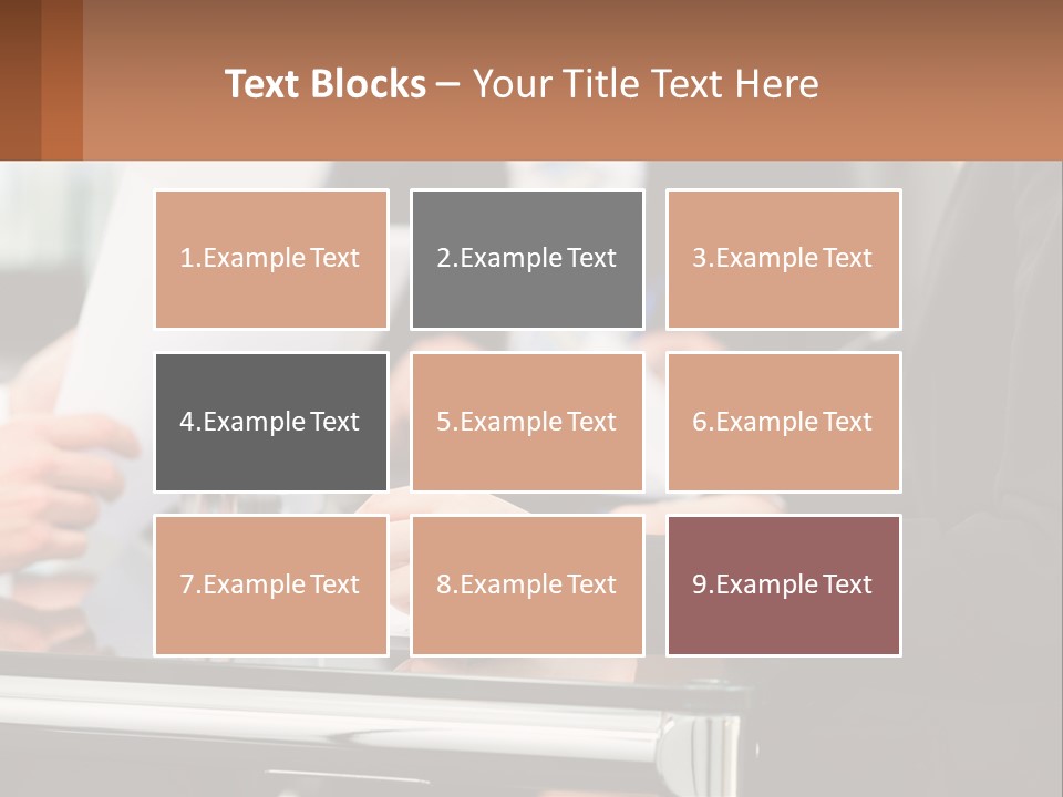 A Group Of People Sitting At A Table Writing On Paper PowerPoint Template