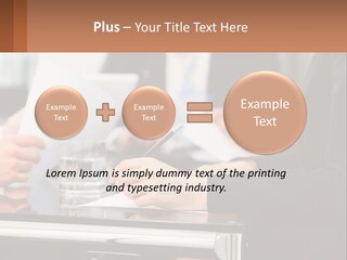 A Group Of People Sitting At A Table Writing On Paper PowerPoint Template