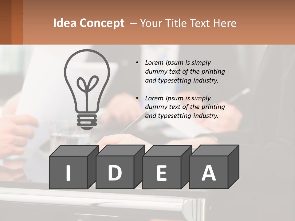 A Group Of People Sitting At A Table Writing On Paper PowerPoint Template