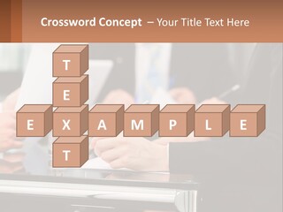 A Group Of People Sitting At A Table Writing On Paper PowerPoint Template