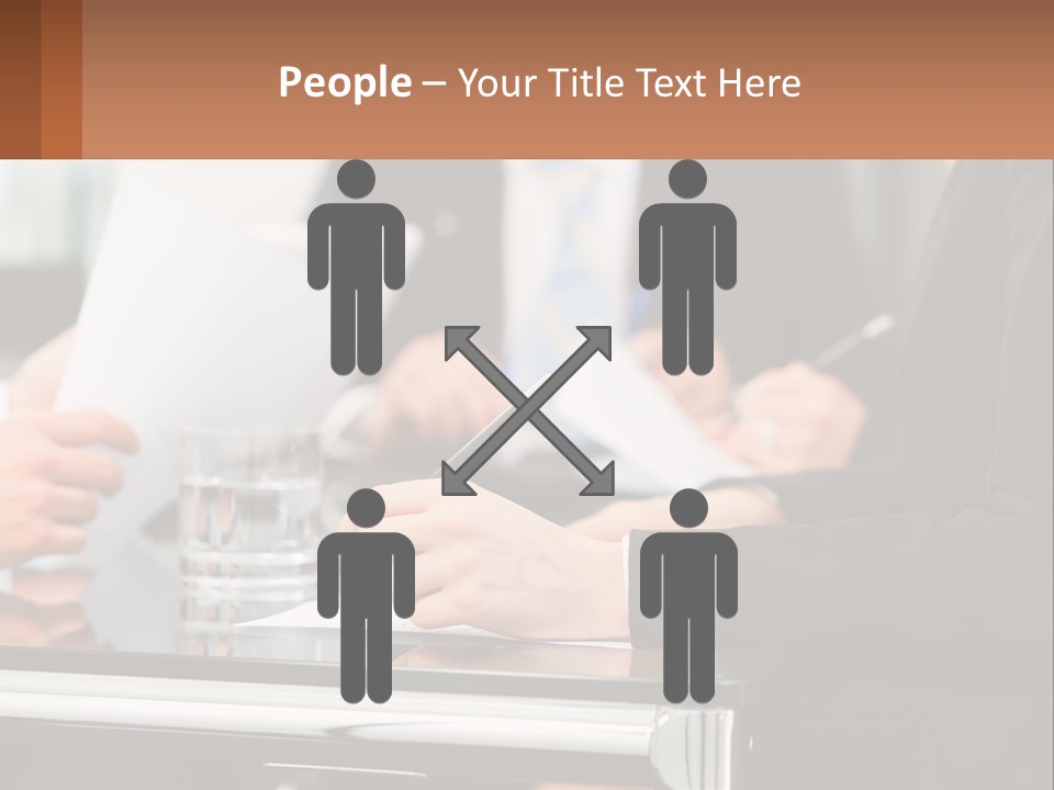 A Group Of People Sitting At A Table Writing On Paper PowerPoint Template