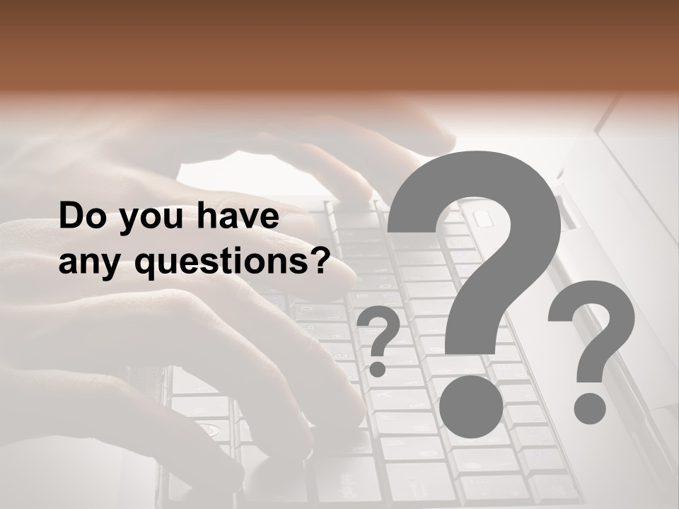 A Person Typing On A Laptop With Their Hands PowerPoint Template