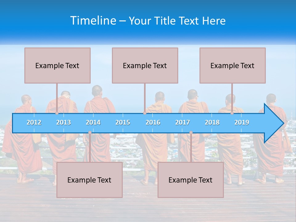 A Group Of Monks Standing On Top Of A Wooden Platform PowerPoint Template