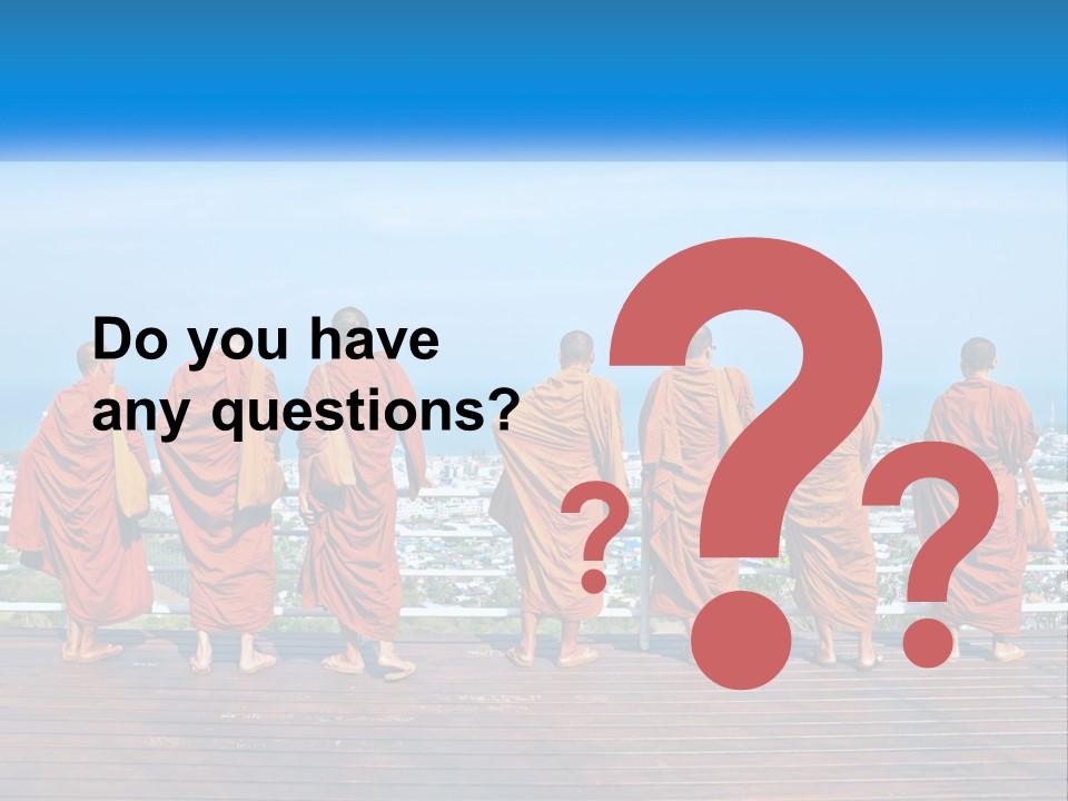 A Group Of Monks Standing On Top Of A Wooden Platform PowerPoint Template