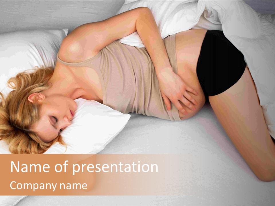 A Woman Laying On A Bed With Her Stomach Exposed PowerPoint Template