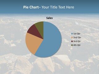 An Aerial View Of A Stone Building In The Desert PowerPoint Template