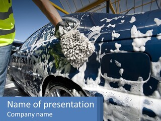 A Person Washing A Car With A Sponge Powerpoint Template PowerPoint Template