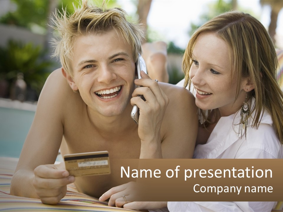 A Man And A Woman Laying On The Ground Talking On Their Cell Phones PowerPoint Template