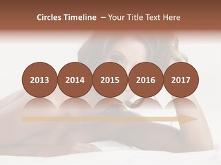A Beautiful Woman Laying On Top Of A Bed PowerPoint Template