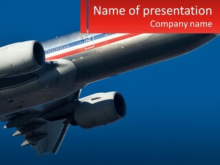 A Large Jetliner Flying Through A Blue Sky PowerPoint Template