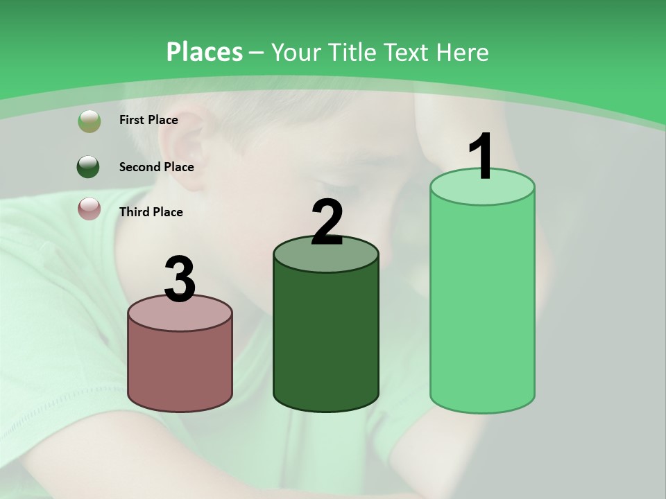 A Young Boy Sitting In Front Of A Laptop Computer PowerPoint Template