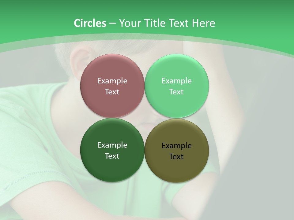 A Young Boy Sitting In Front Of A Laptop Computer PowerPoint Template