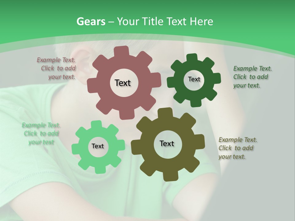 A Young Boy Sitting In Front Of A Laptop Computer PowerPoint Template