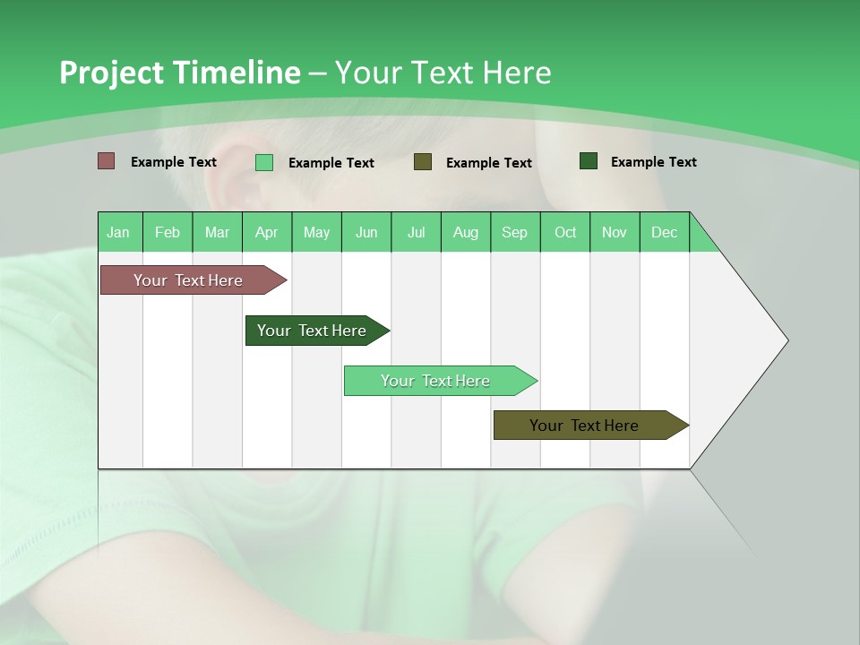 A Young Boy Sitting In Front Of A Laptop Computer PowerPoint Template