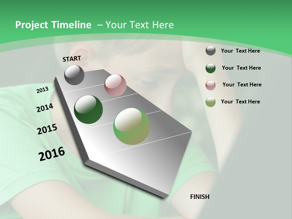 A Young Boy Sitting In Front Of A Laptop Computer PowerPoint Template