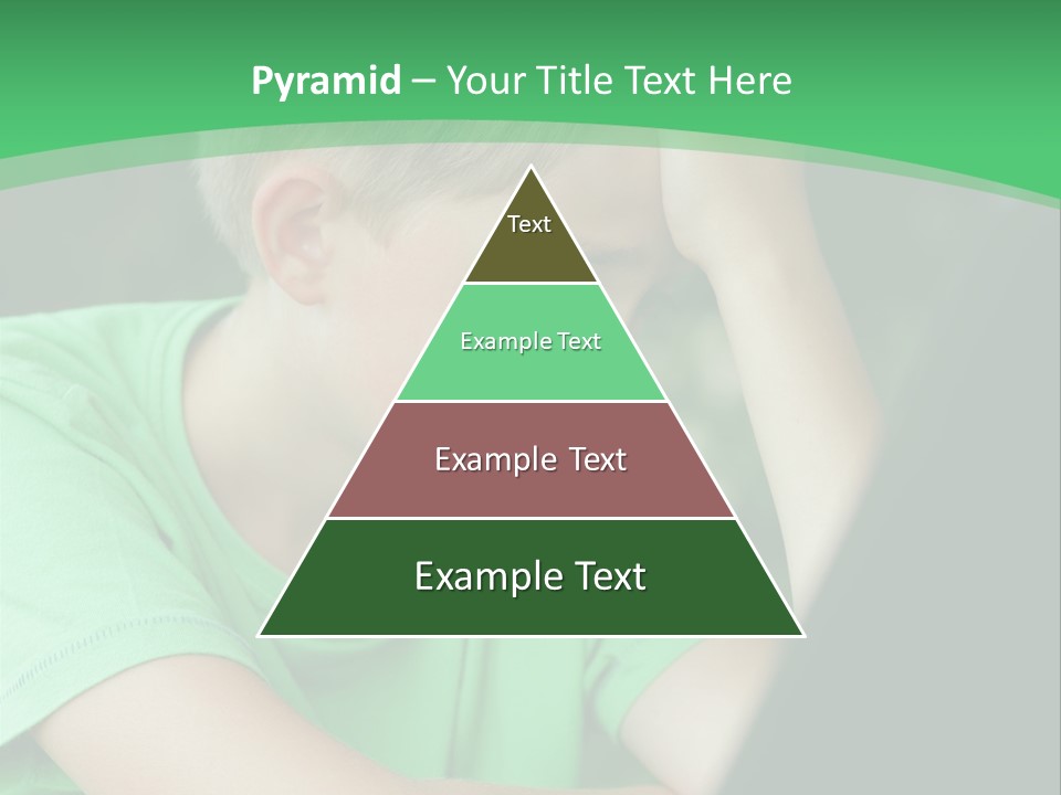 A Young Boy Sitting In Front Of A Laptop Computer PowerPoint Template