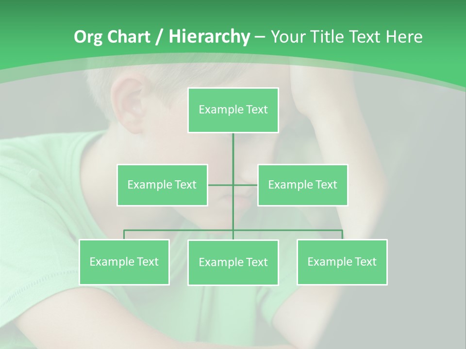 A Young Boy Sitting In Front Of A Laptop Computer PowerPoint Template