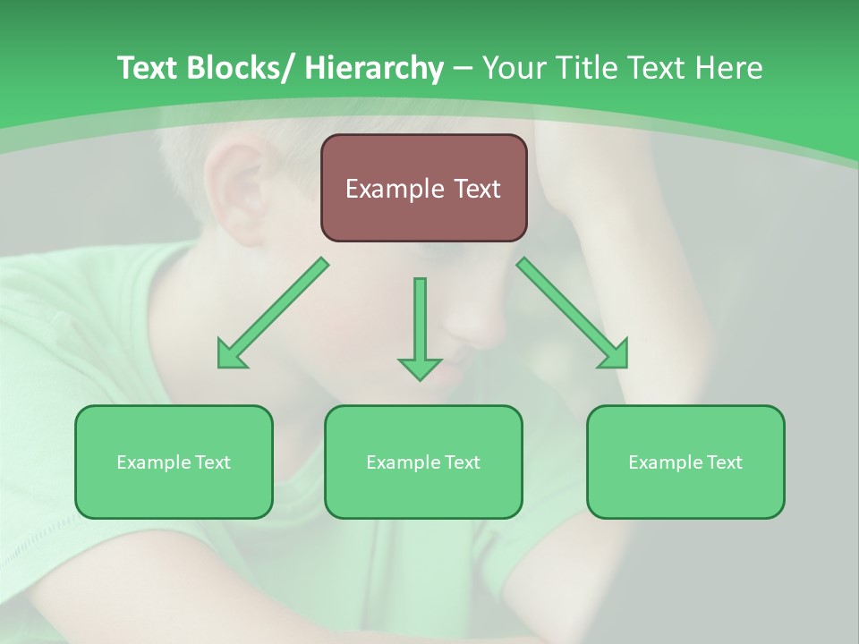 A Young Boy Sitting In Front Of A Laptop Computer PowerPoint Template