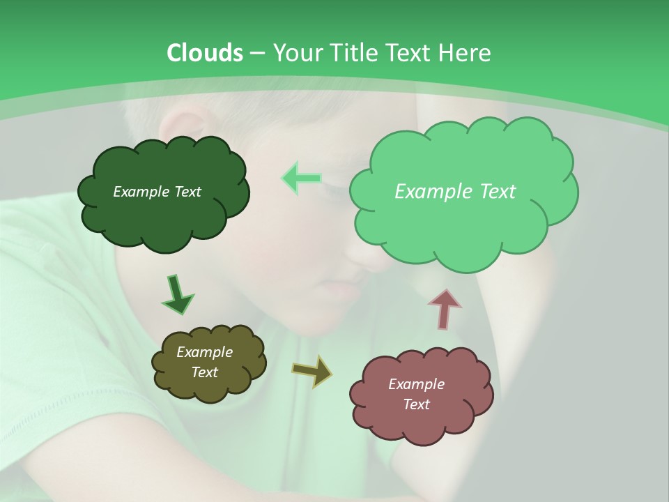 A Young Boy Sitting In Front Of A Laptop Computer PowerPoint Template