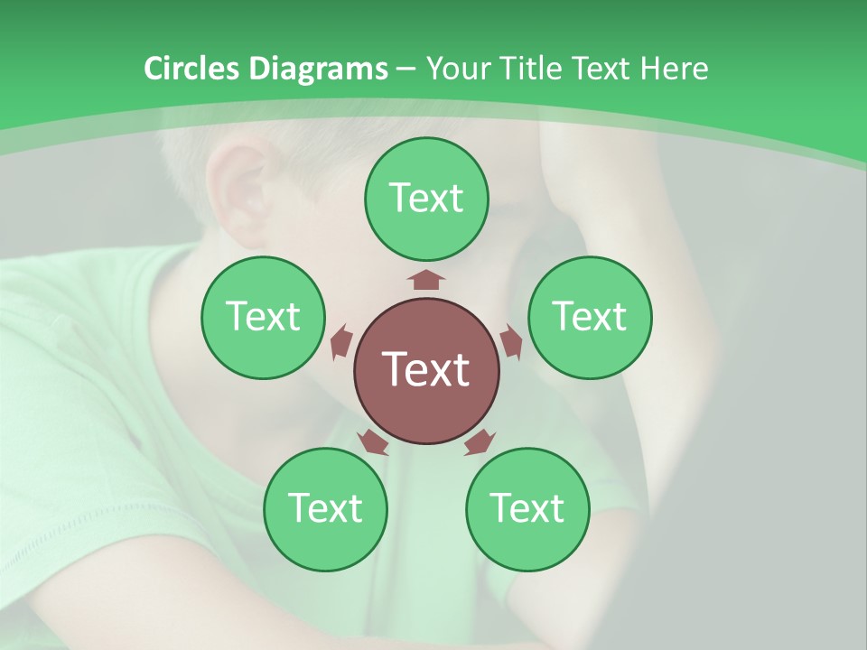 A Young Boy Sitting In Front Of A Laptop Computer PowerPoint Template