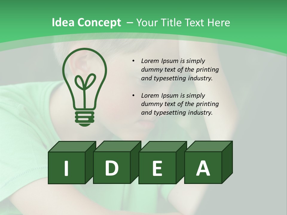 A Young Boy Sitting In Front Of A Laptop Computer PowerPoint Template