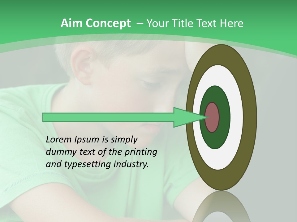 A Young Boy Sitting In Front Of A Laptop Computer PowerPoint Template