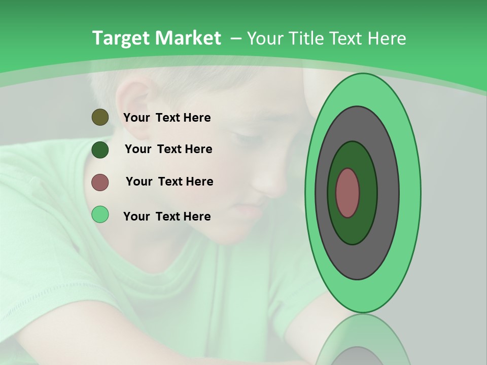 A Young Boy Sitting In Front Of A Laptop Computer PowerPoint Template