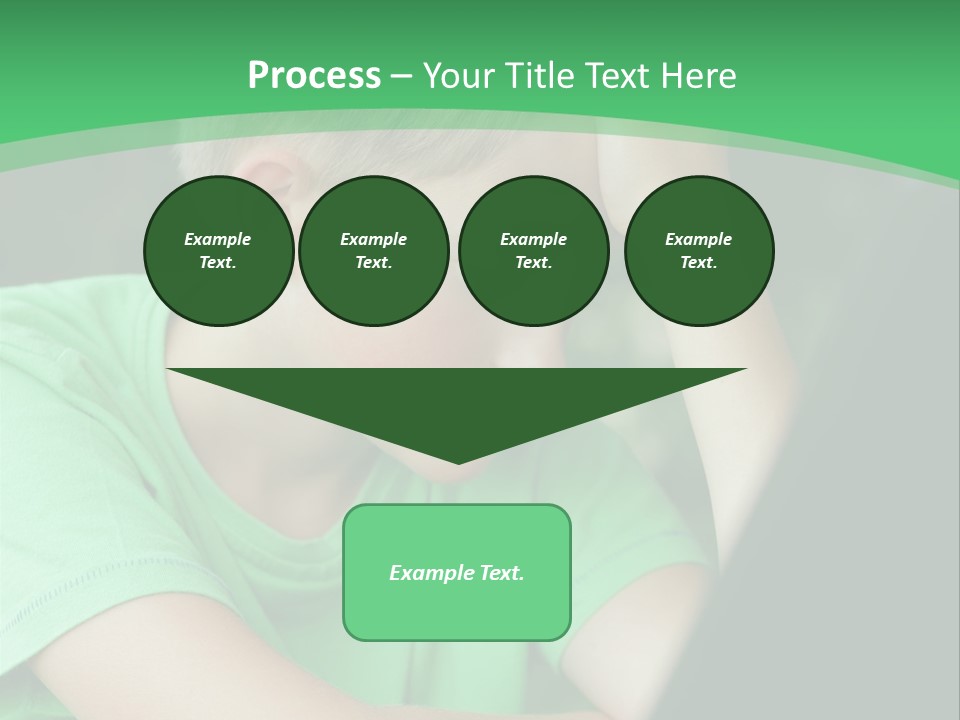 A Young Boy Sitting In Front Of A Laptop Computer PowerPoint Template