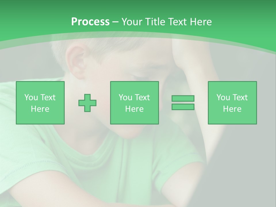 A Young Boy Sitting In Front Of A Laptop Computer PowerPoint Template