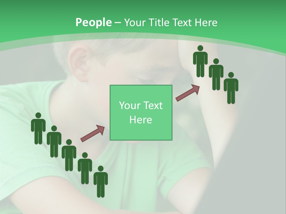 A Young Boy Sitting In Front Of A Laptop Computer PowerPoint Template