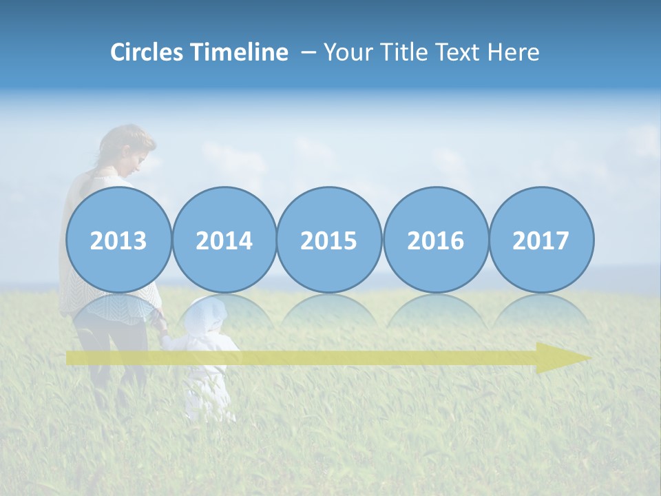 A Woman Holding A Child's Hand In A Field Of Grass PowerPoint Template