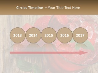 A Drink With Ice And Strawberries On A Wooden Table PowerPoint Template