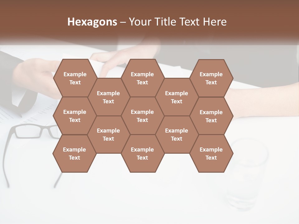 Two People Sitting At A Table Signing Papers PowerPoint Template