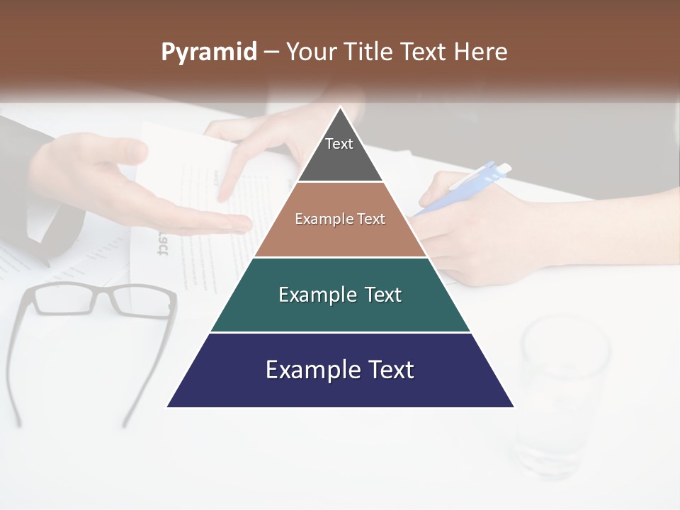 Two People Sitting At A Table Signing Papers PowerPoint Template