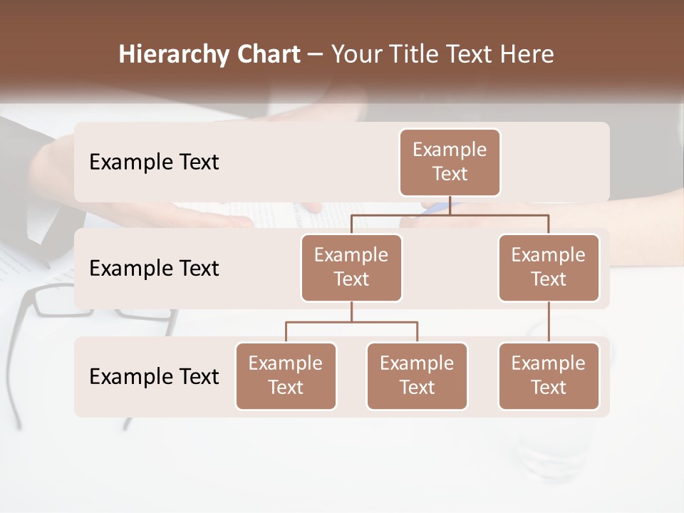 Two People Sitting At A Table Signing Papers PowerPoint Template