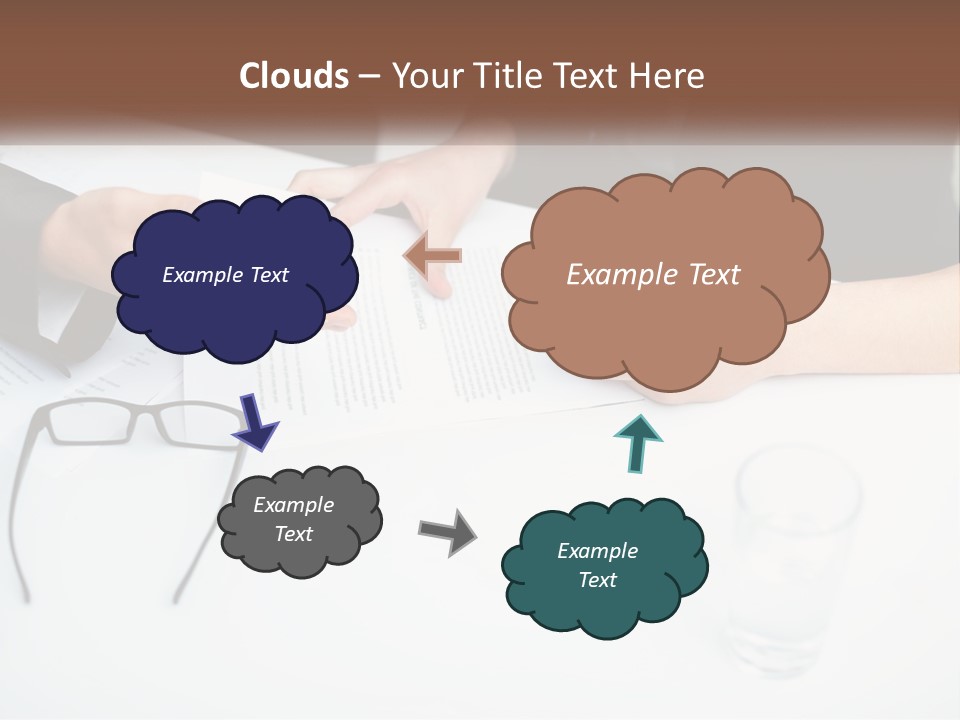Two People Sitting At A Table Signing Papers PowerPoint Template