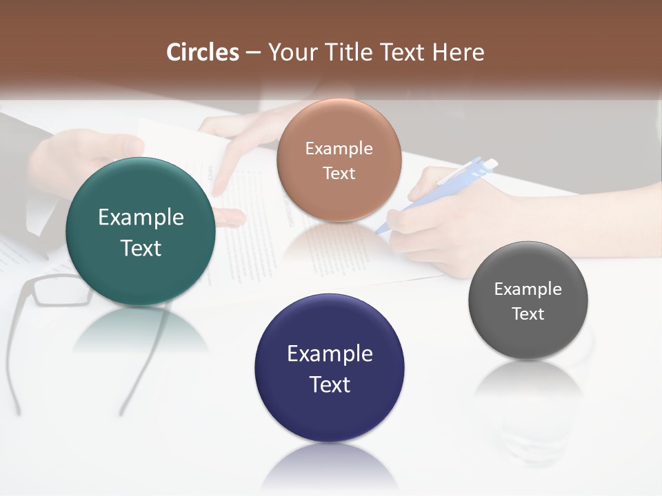 Two People Sitting At A Table Signing Papers PowerPoint Template