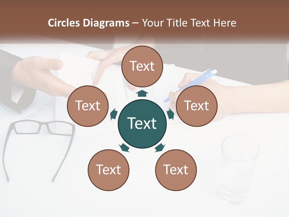 Two People Sitting At A Table Signing Papers PowerPoint Template