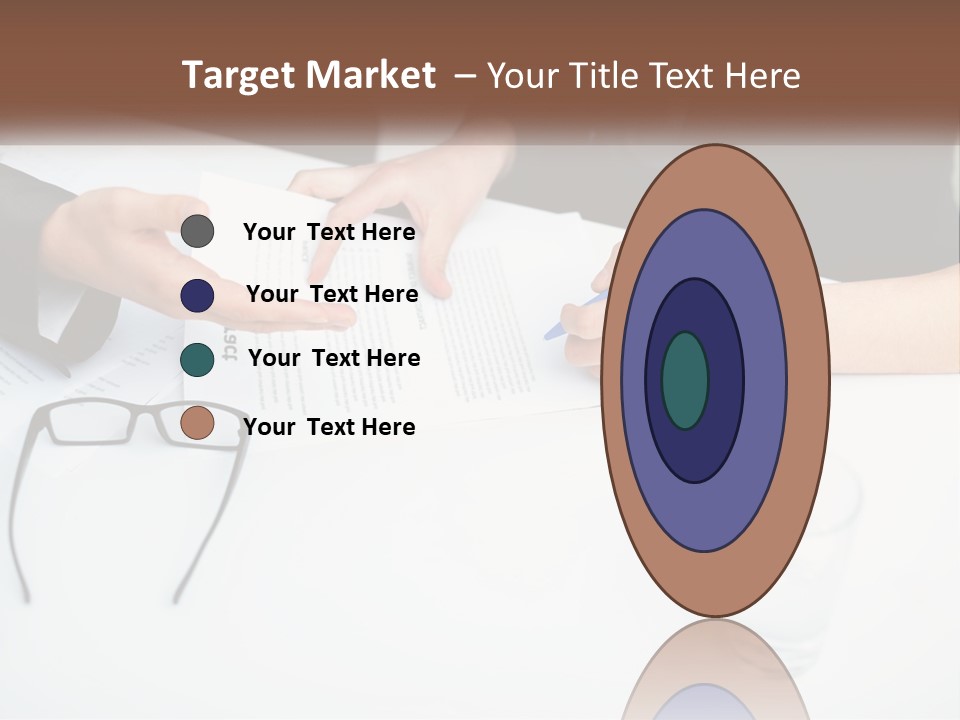 Two People Sitting At A Table Signing Papers PowerPoint Template