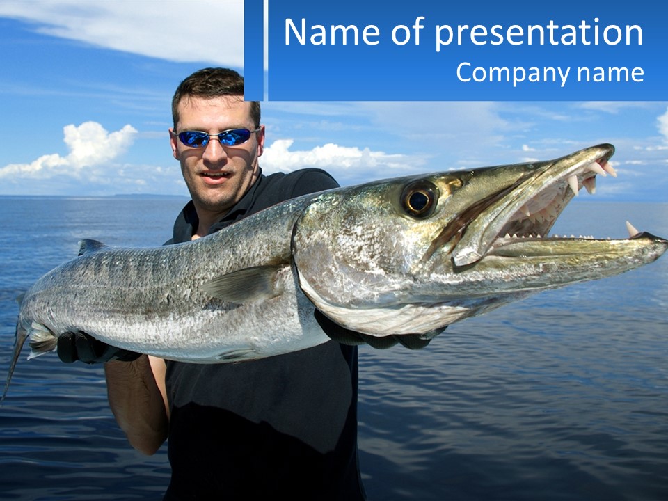 A Man Holding A Large Fish On A Boat PowerPoint Template