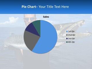 A Man Holding A Large Fish On A Boat PowerPoint Template