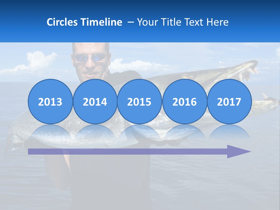 A Man Holding A Large Fish On A Boat PowerPoint Template