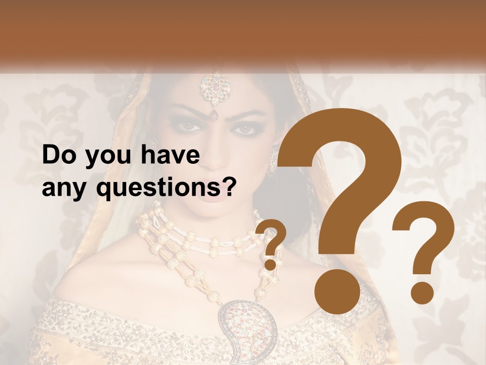 A Beautiful Woman In A Bridal Gown With A Veil On Her Head PowerPoint Template