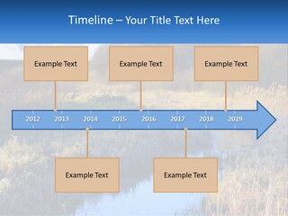 A River Running Through A Lush Green Field PowerPoint Template