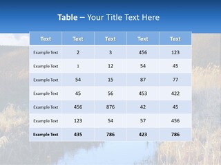 A River Running Through A Lush Green Field PowerPoint Template