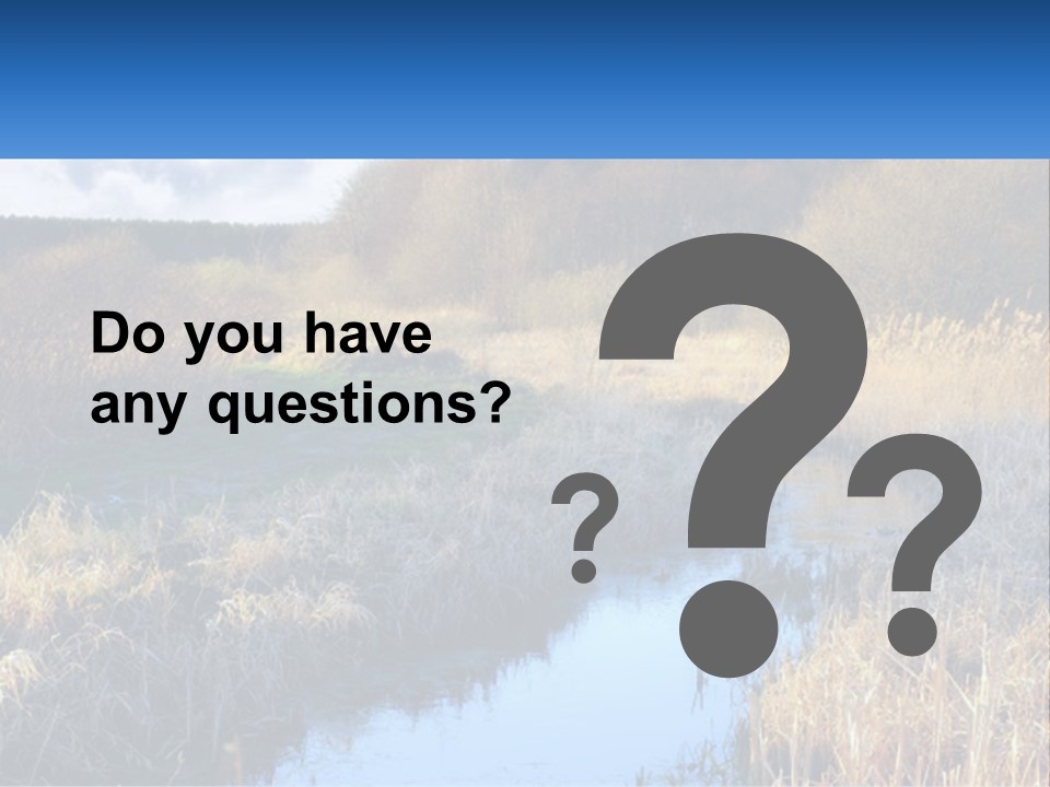 A River Running Through A Lush Green Field PowerPoint Template