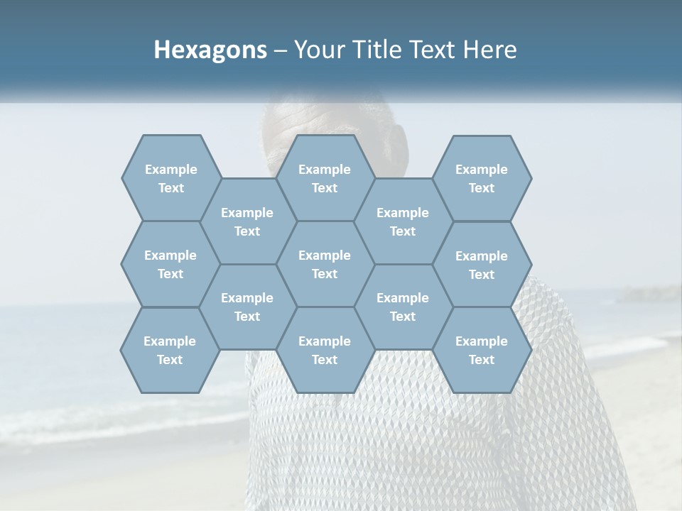 A Man Standing On A Beach With The Ocean In The Background PowerPoint Template