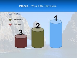 A Large Rock Formation In The Middle Of A Body Of Water PowerPoint Template